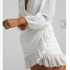 Showpo. Can I bee your honey mini Long sleeve white dress.